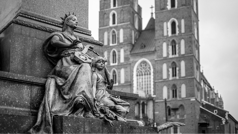 Memorial statue of the Romantic poet Adam Mickiewicz located at Stare Miasto Rynek Glowny in Krakow, Poland.